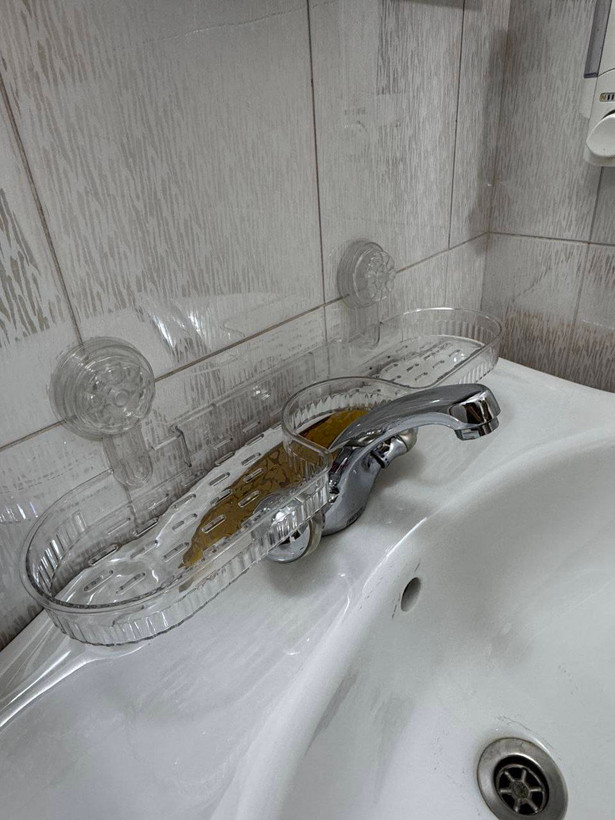 نظم دهنده پشت شیر روشویی